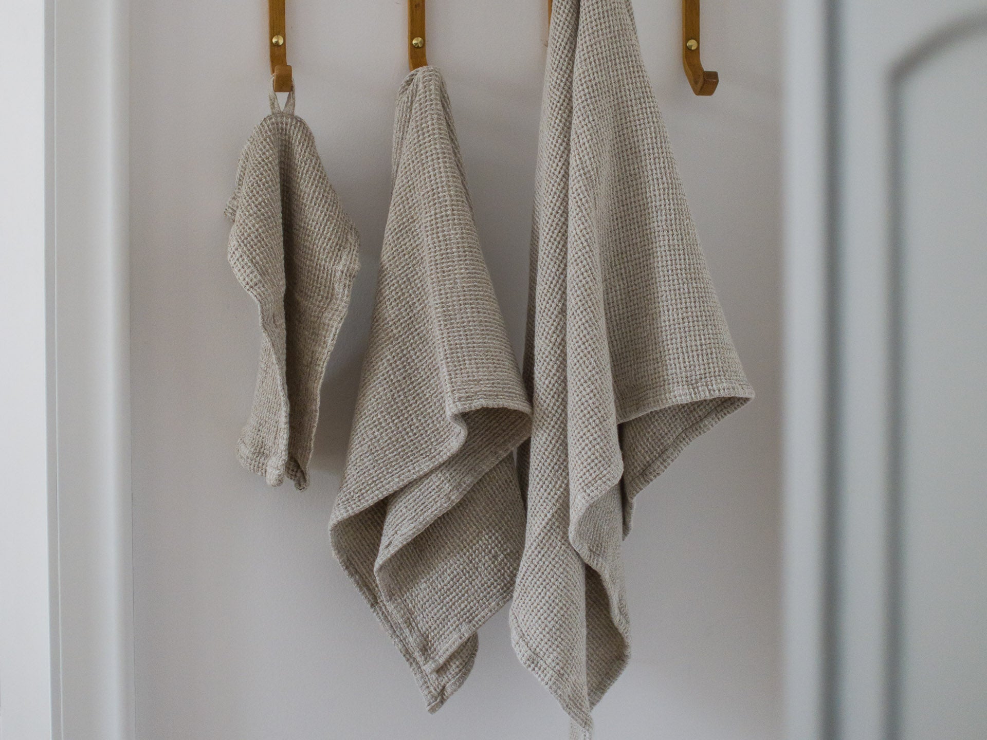 Linen Waffle Towel Set hanging on hooks - Natural Taupe - Lagodie Product Photo